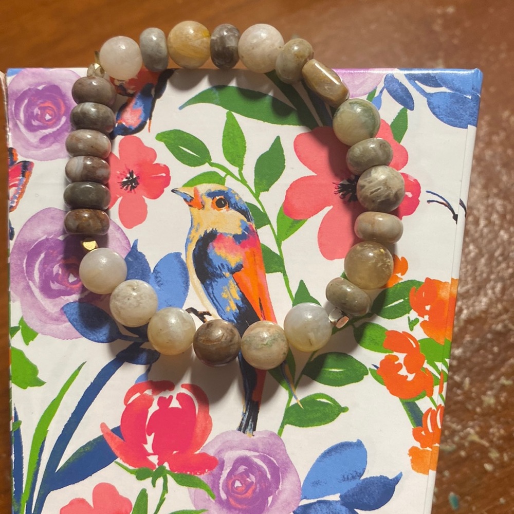 A brownish grey white bracelet